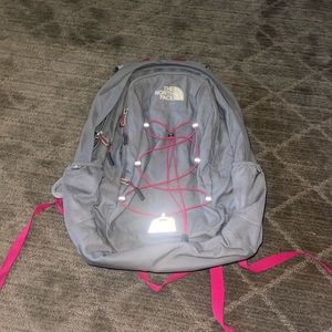 Pink and gray north face backpack in good condition